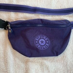 $145 New Kipling nylon purple belt bag, never used